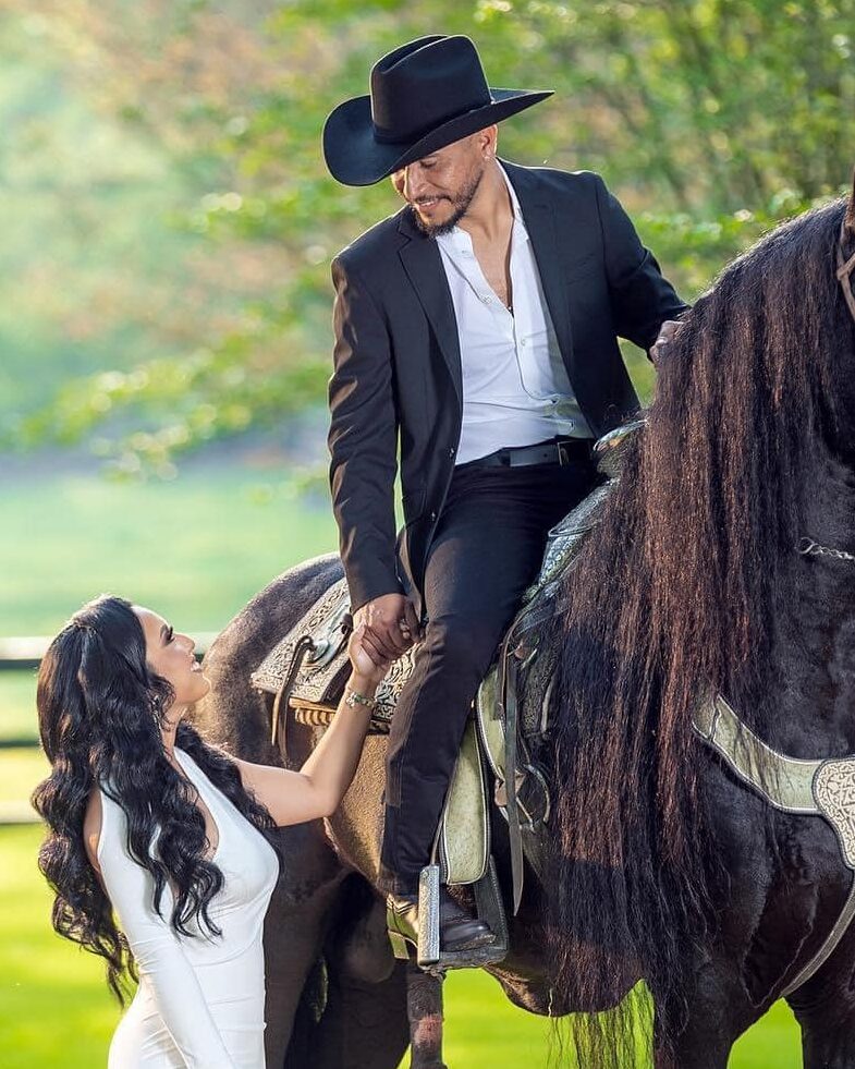 The Ultimate Groom's Guide to an Epic Wedding Day in Cleveland, TX 1 Western Style Wedding With A Groom On Horseback And The Bride Looking At Him, Outdoors Ranch Wedding